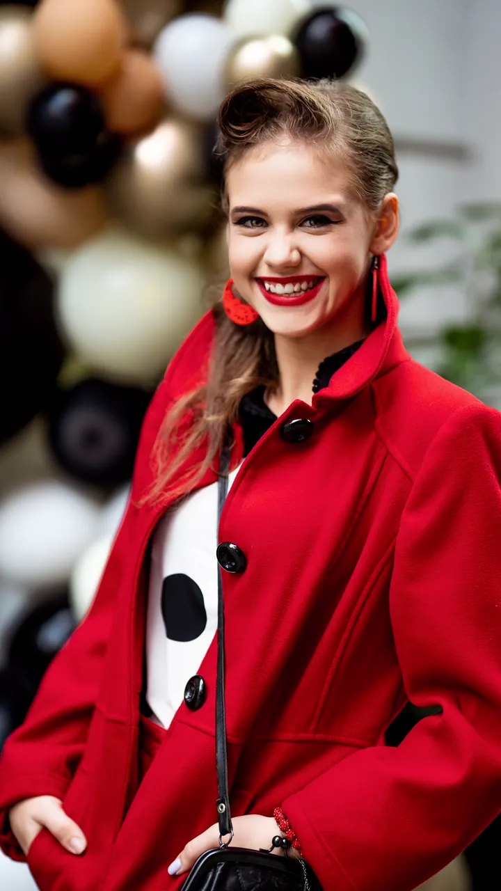 Portrait of Amelia in a red coat