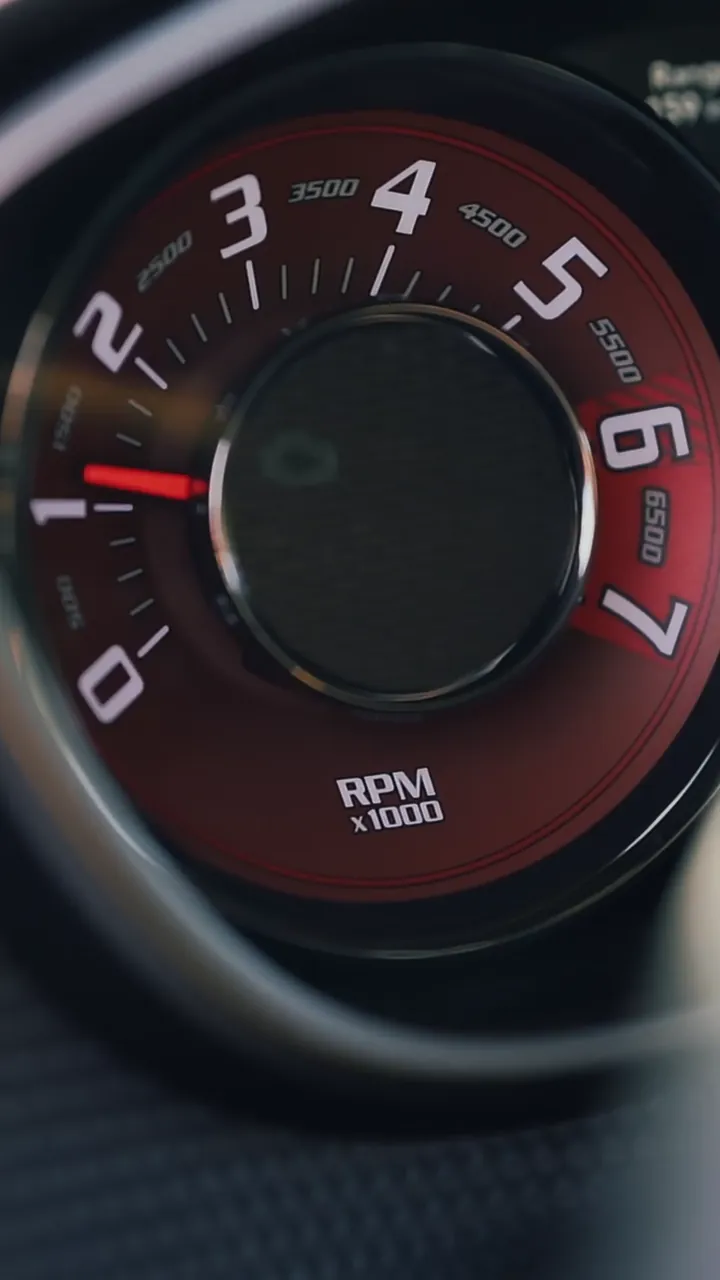 Close-up of a Dodge Challenger tachometer